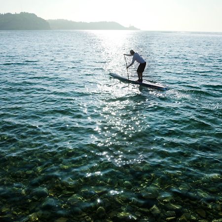Hotel Slovenija - Terme & Wellness Lifeclass Portorož Exterior foto Stand-up paddle boarder on Lake Balaton