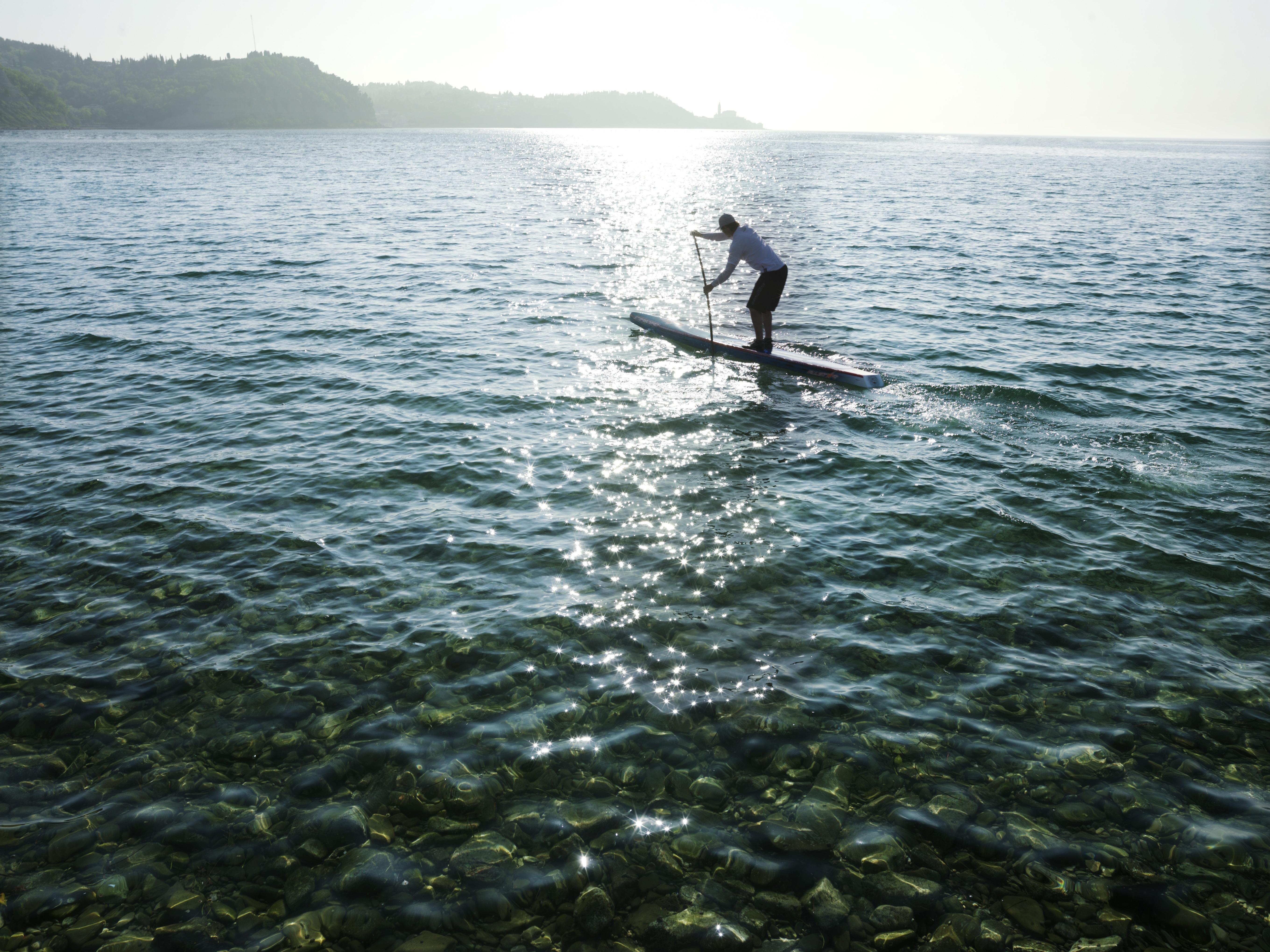 Hotel Slovenija - Terme & Wellness Lifeclass Portorož Exterior foto Stand-up paddle boarder on Lake Balaton